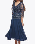 JH0604
Embroidered lurex lace dress with full chiffon skirt