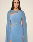 6396 long evening chiffon one shoulder gown with matching beaded cape .