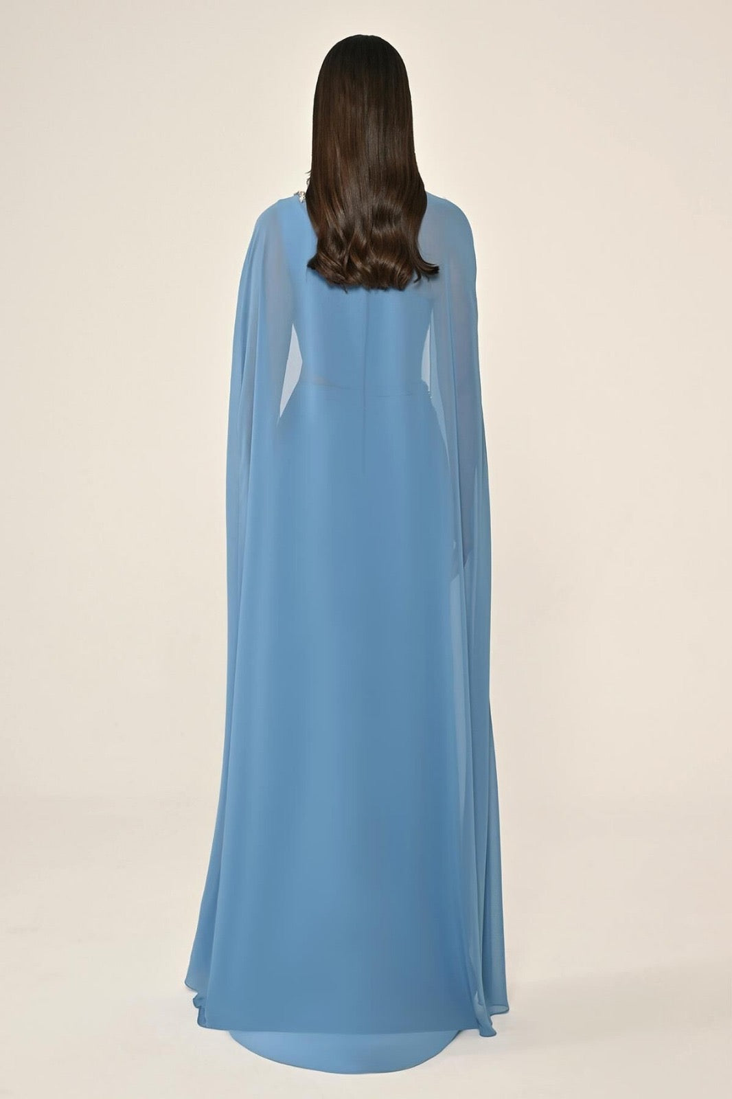 6396 long evening chiffon one shoulder gown with matching beaded cape .