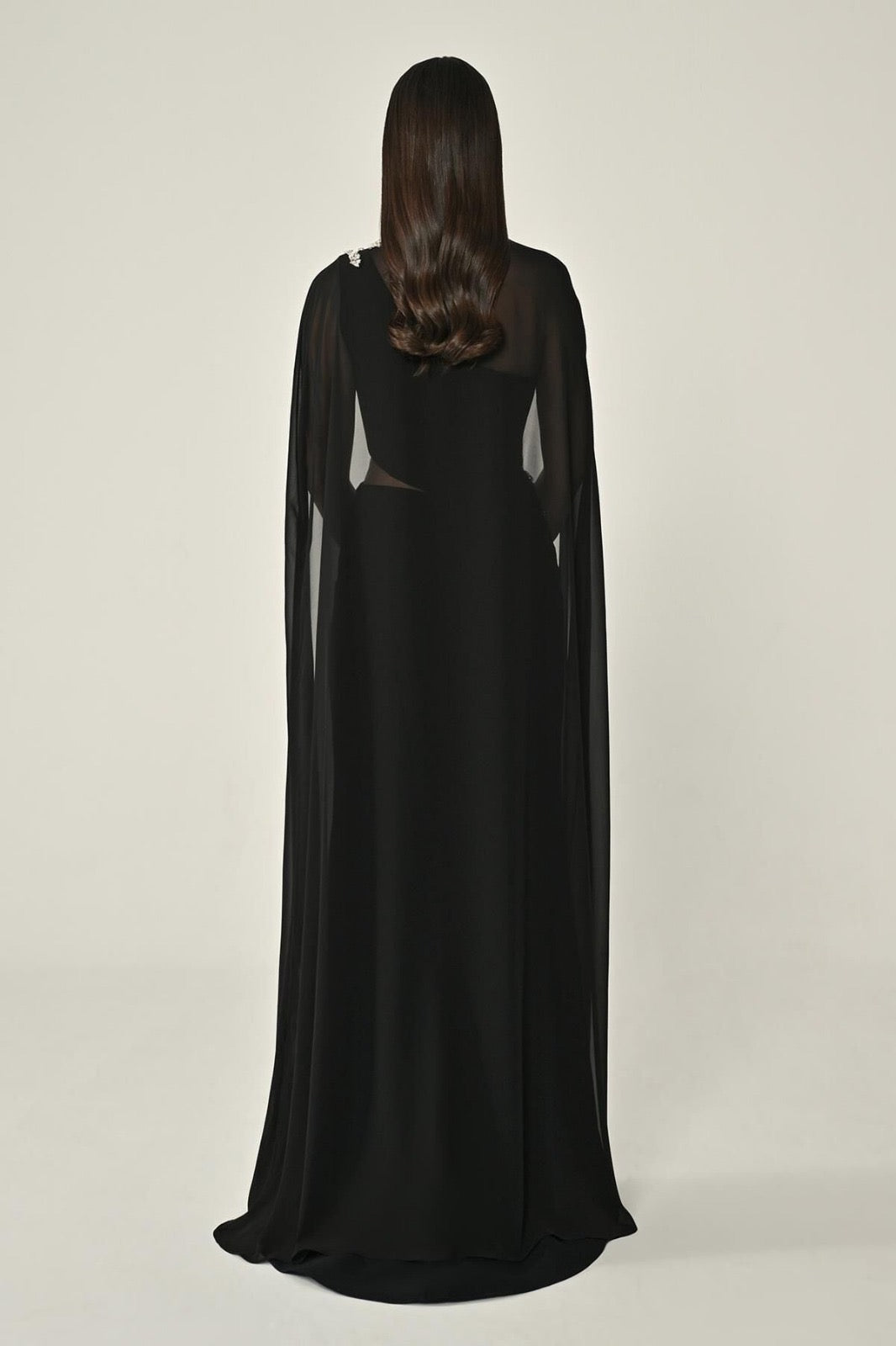 6396 long evening chiffon one shoulder gown with matching beaded cape .