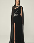 6396 long evening chiffon one shoulder gown with matching beaded cape .
