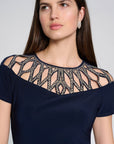 Silky Knit Sheath Dress With Embellished Neckline